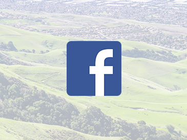 hills and facebook icon in square
