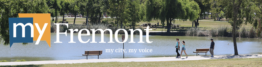 people walking in park along lake with myFremont, my city, my voice text