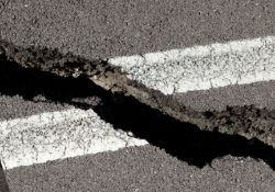 Earthquake, road with big open crack